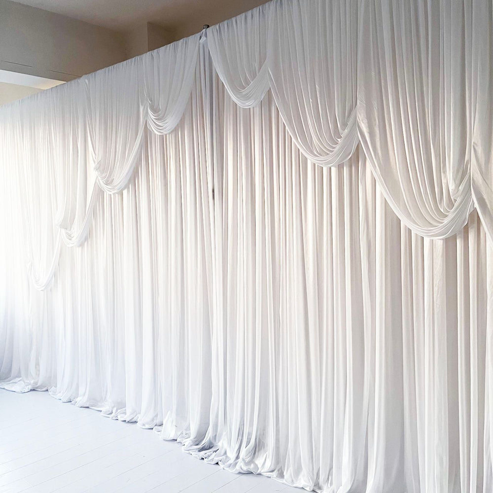 Ice Silk Event Backdrop with Venetian Contour Stage Curtain / Valance Swag (White) 6m wide x 3m high side view