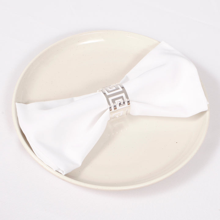 Silver Napkin Ring - Geometric Luxe Meander with napkin on a plate