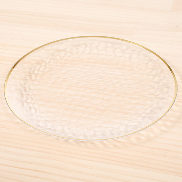 Plastic Dinner Plate - Clear with Gold Trim (19cm) on timber