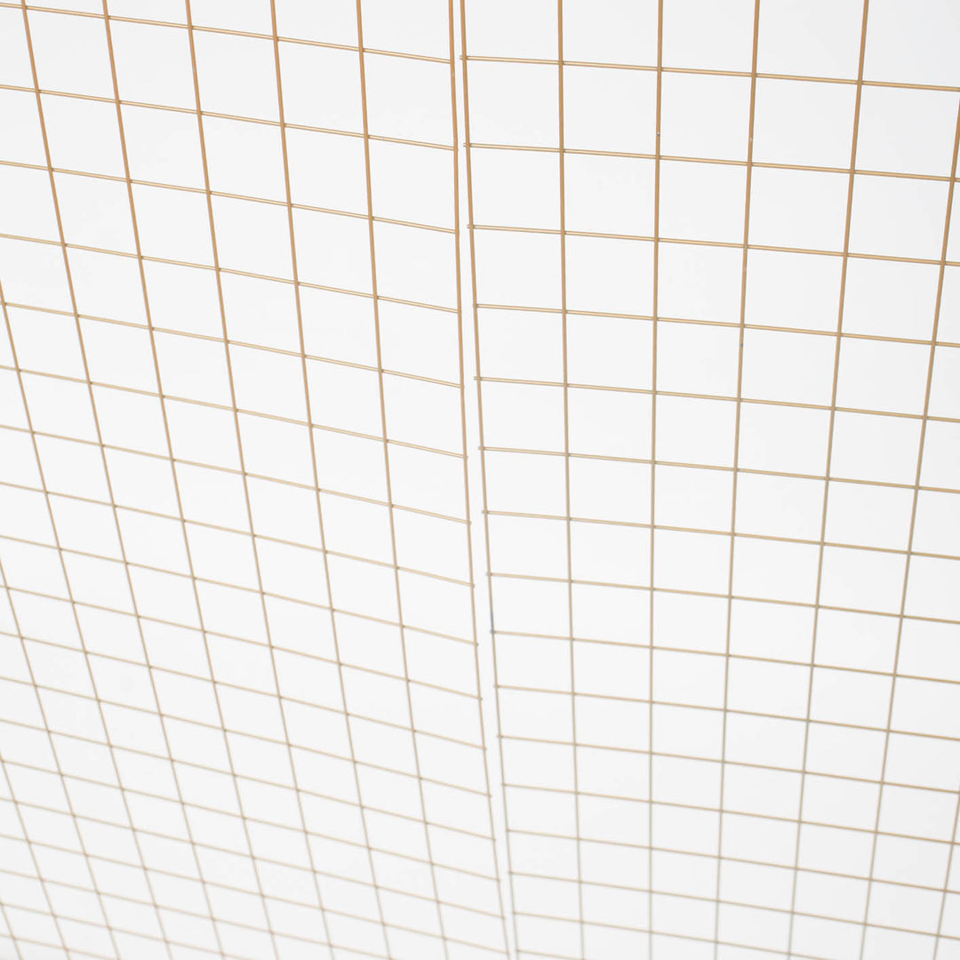 gold mesh frame prior to being cable tied together