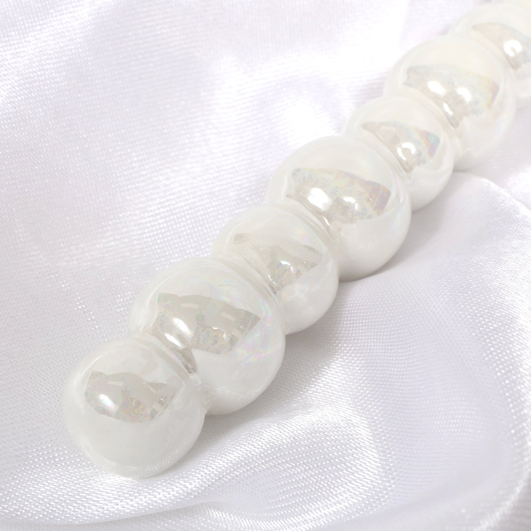 Cake Knife & Server Set - Bubble Handle - Silver (2pc),close up of pearl-like handle on top of white satin