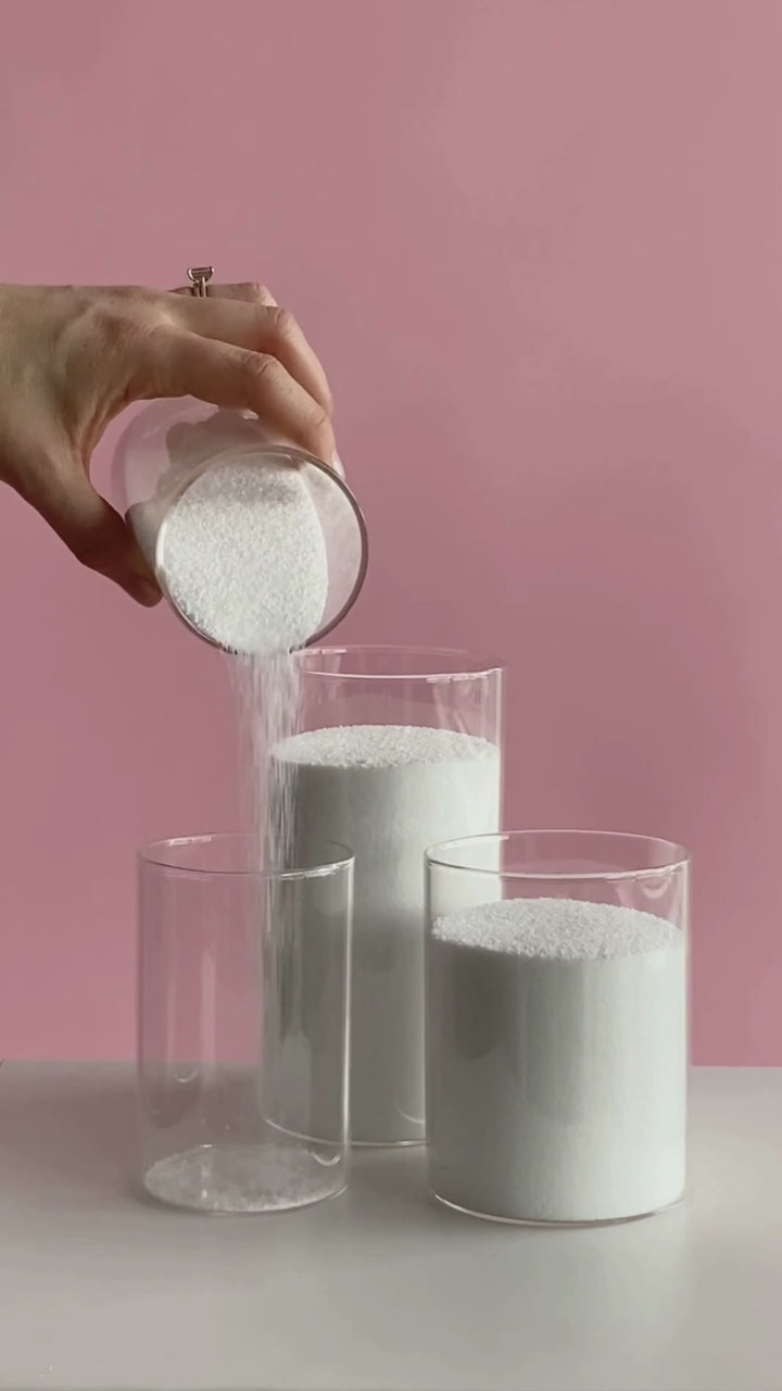 A "How to" video on creating a sand candle. Pouring the wax, placing the wick in sand and lighting the wick.