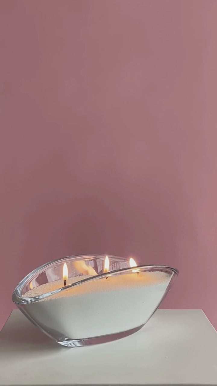 Video showing four different sand candle variations