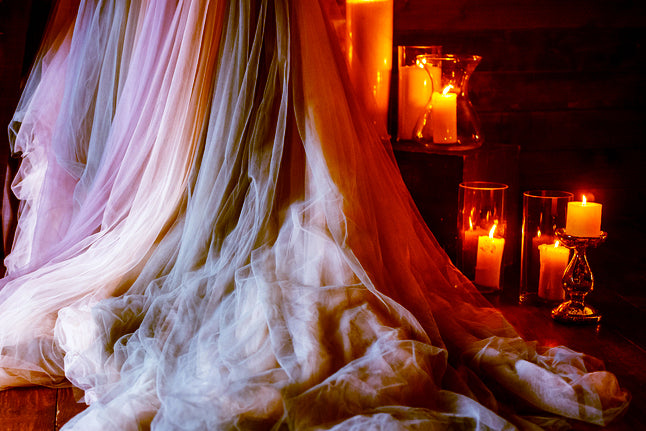 Layered Flowing Tulle Fabric with Candles Moody Atmosphere