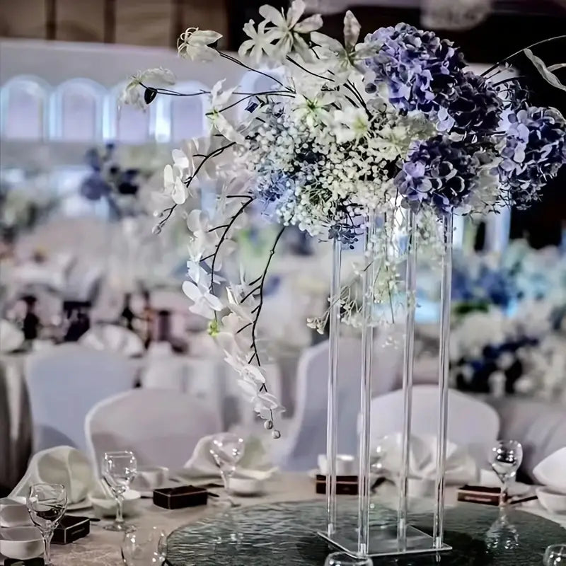 Clear Acrylic Plinth centrepiece with flowers on table