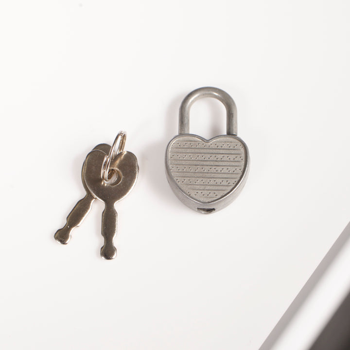 Close up of heart lock and keys