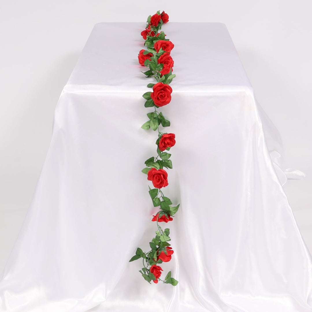 Red rose garland on a white tablecloth