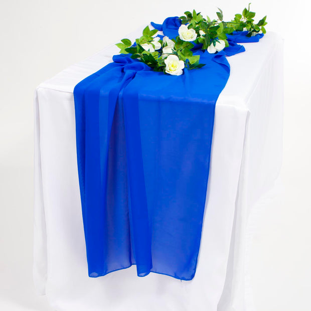 Royal Blue Chiffon Table Runner on White Tablecloth with flower vine