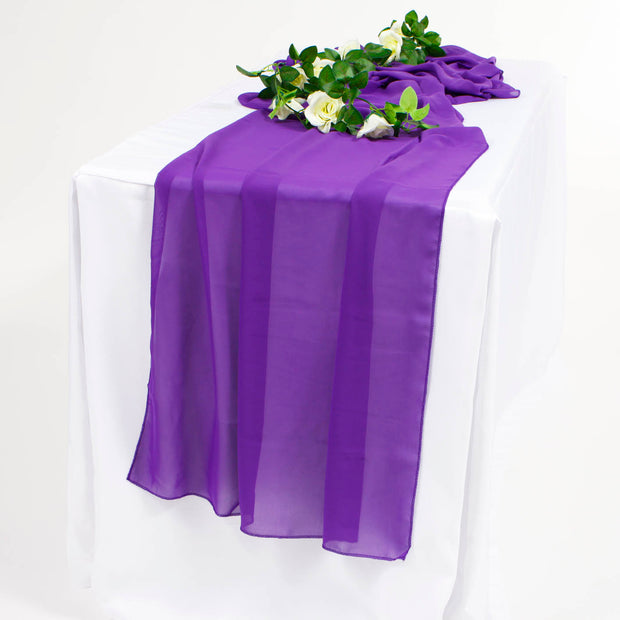 Purple Chiffon Table Runner on white tablecloth with flower vine