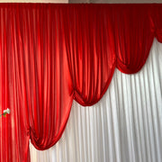 Ice Silk Satin Draping Backdrops - 6 meters length x 3 meters high - Red. Close upIce Silk Event Backdrop with Venetian Contour Stage Curtain / Valance Swag (Red and White) 3m wide x 3m high close up two