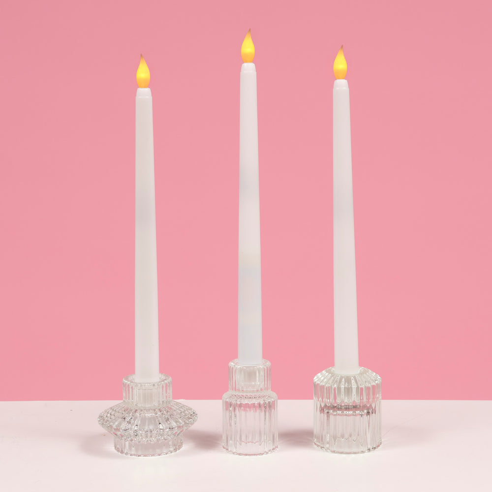 LED Flameless Taper Candle - White example with various candle holders