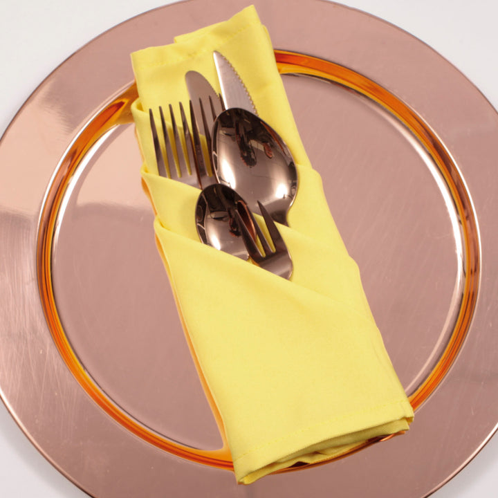 Cloth Napkins - Yellow (50x50cm) with rose gold cutlery set on a shiny rose gold charger plate