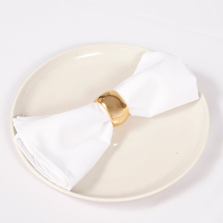 Dark Gold Napkin Ring - Classic Luxe Style with napkin on a plate