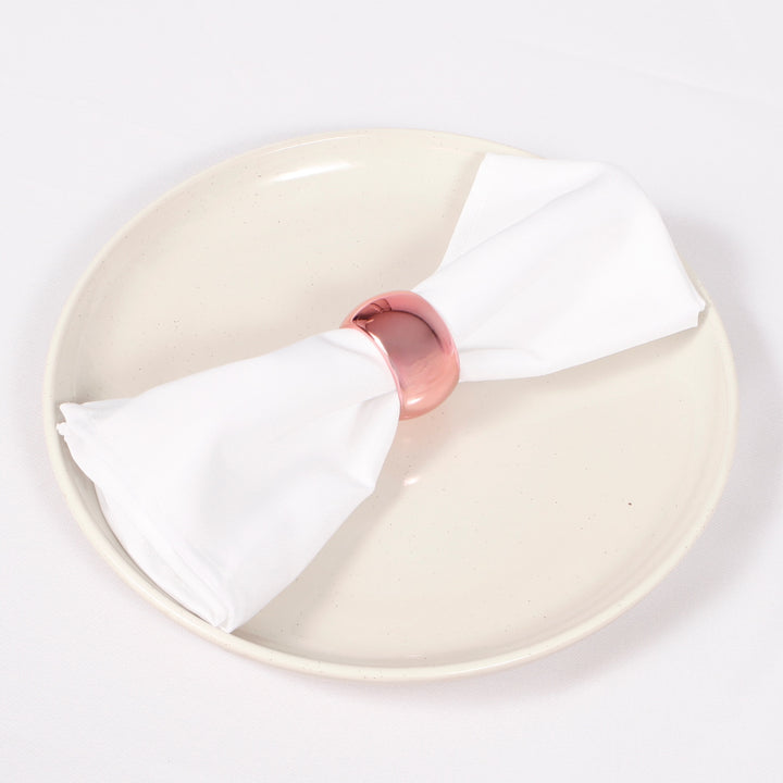 Rose Gold Napkin Ring - Classic Luxe Style, with napkin on a plate