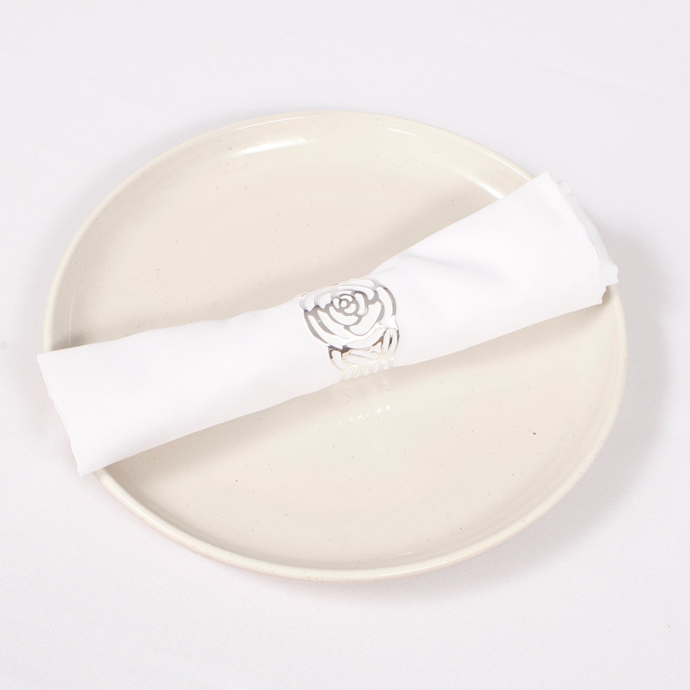 Silver Napkin Ring - Elegant English Rose Cut Out with napkin on a plate