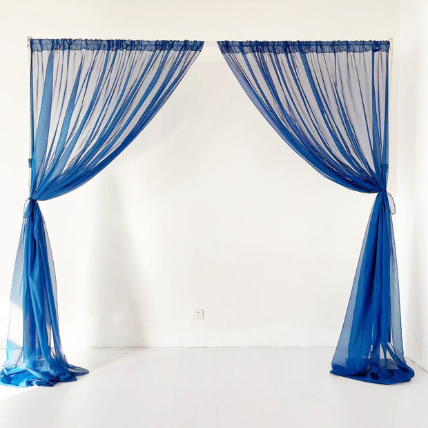 Navy chiffon curtain, centre split, tied to side