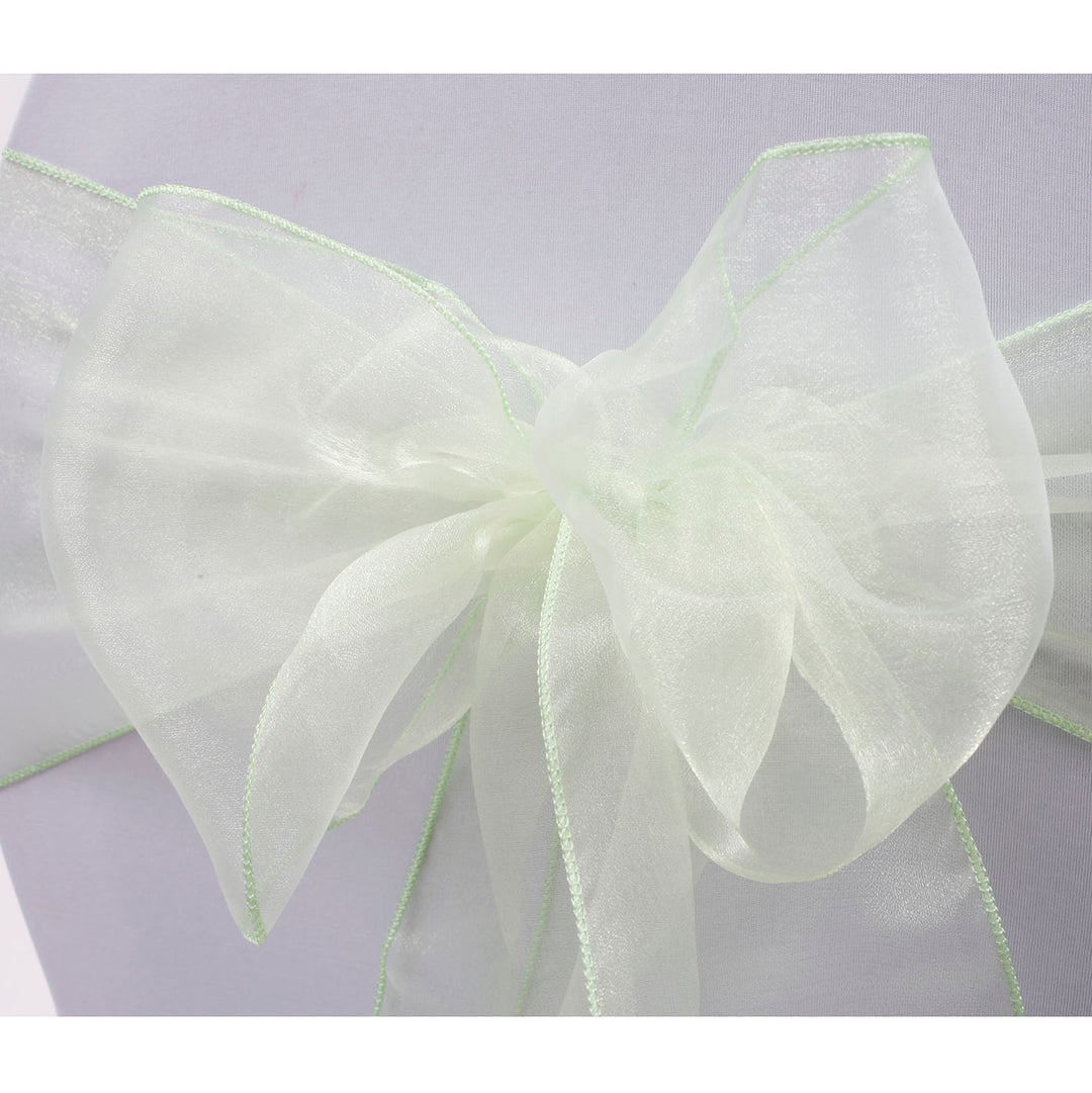 Organza Chair Sash close up view of bow - Light Green