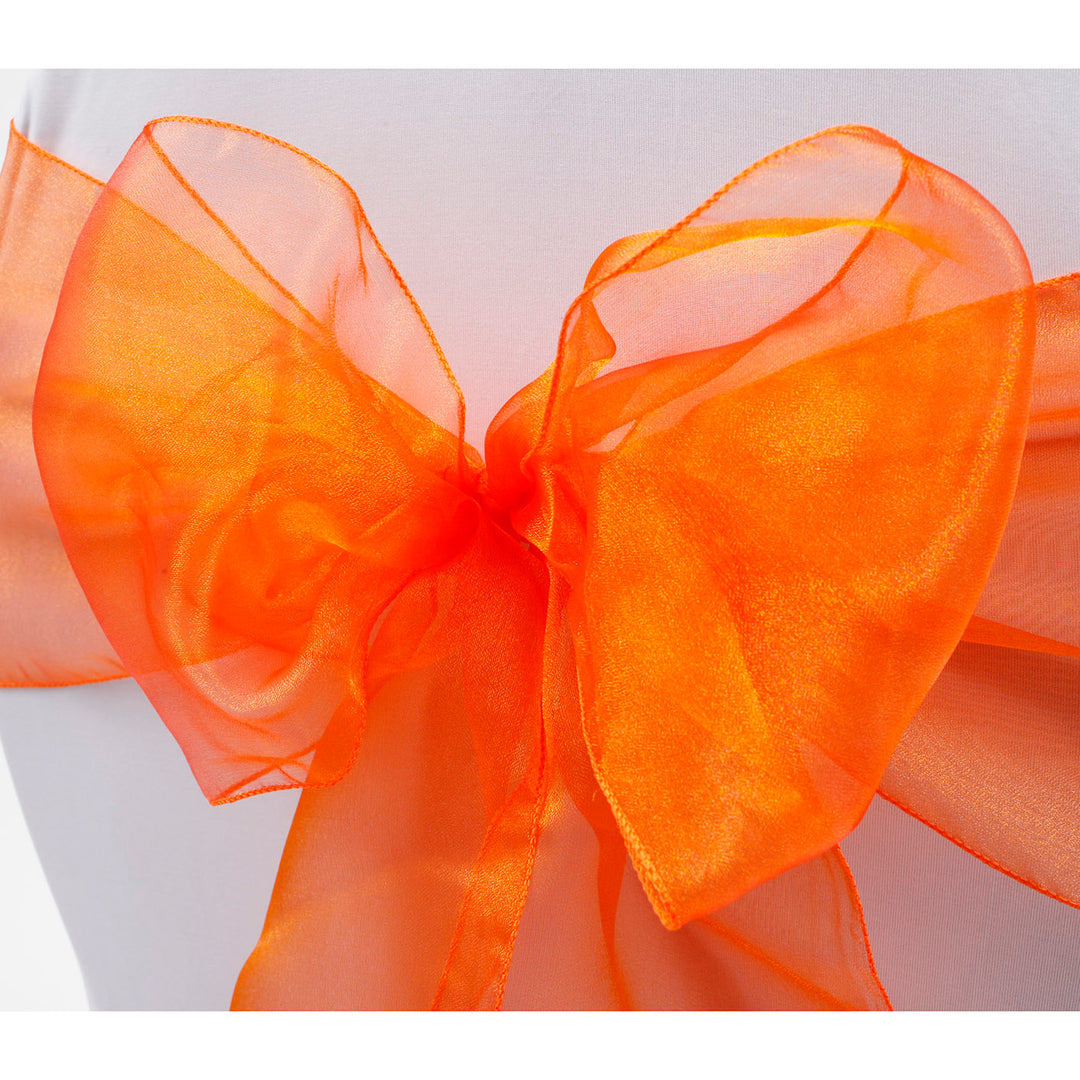 Organza Chair Sash close up view of bow - Orange