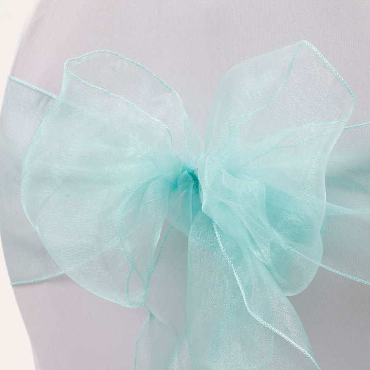 Organza Chair Sash close up view of bow - Turquoise