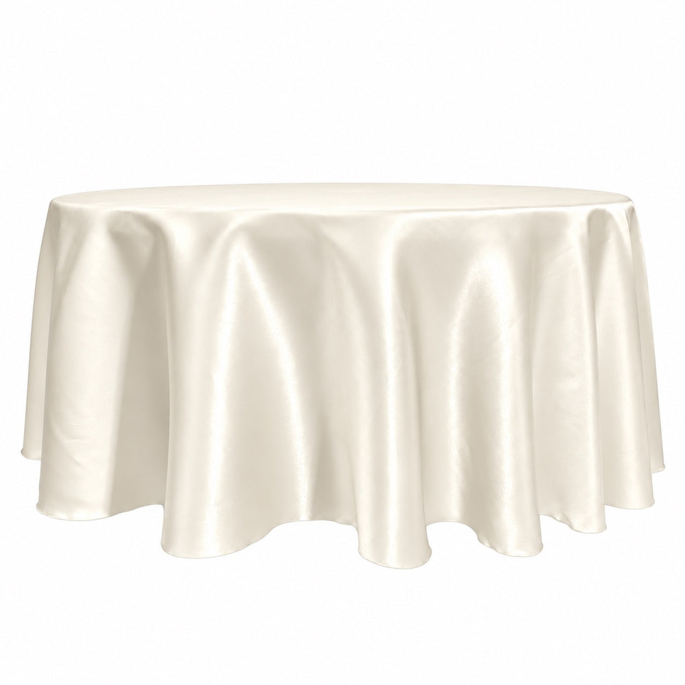An ivory satin round tablecloth draped over a circular table, shown against a plain white background.