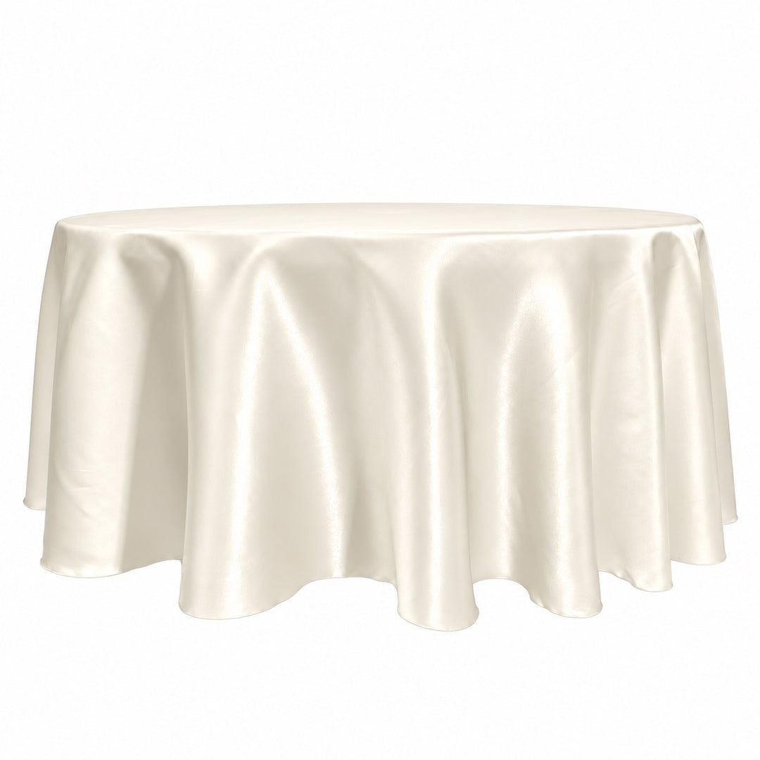 An ivory satin round tablecloth draped over a circular table, shown against a plain white background.