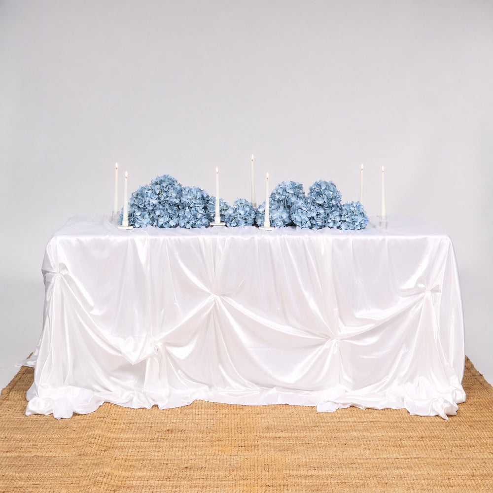 Ice Silk Satin Draping Tablecloth – White (1.5x3m), 3 tablecloths layered to cover 6ft table, with blue hydrangeas and white taper candles 