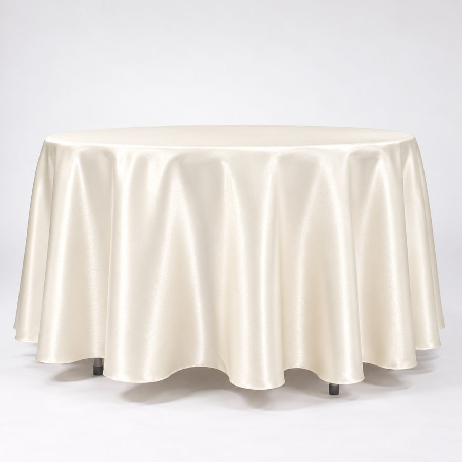 A round table covered with a coloured satin tablecloth