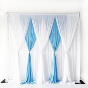 Layered chiffon curtain, white at back and light blue & white panels at front lied in centre