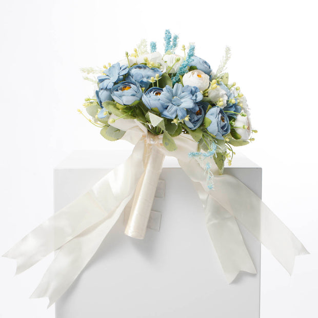 Mixed flower bouquet of Dusty Blue & white roses, blue dasiy & green folage with white ribbon wrapped stems and bow