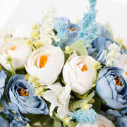 Close up of Dusty Blue & White Roses and Daisybouquet