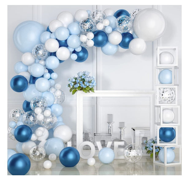 Blue balloon garland wedding setup with white iron stands