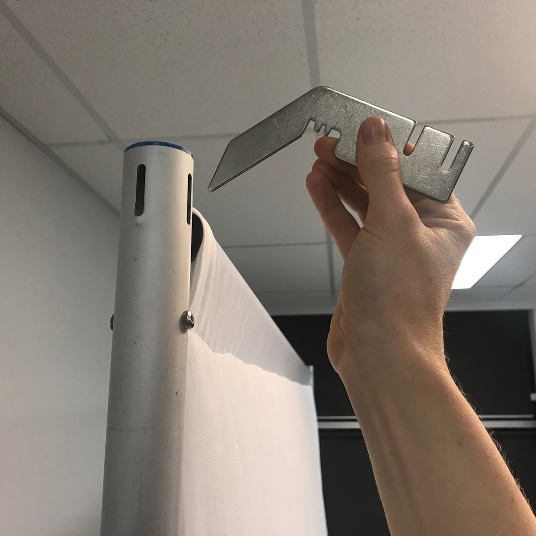 Inserting Backdrop Stand Bracket into Upright