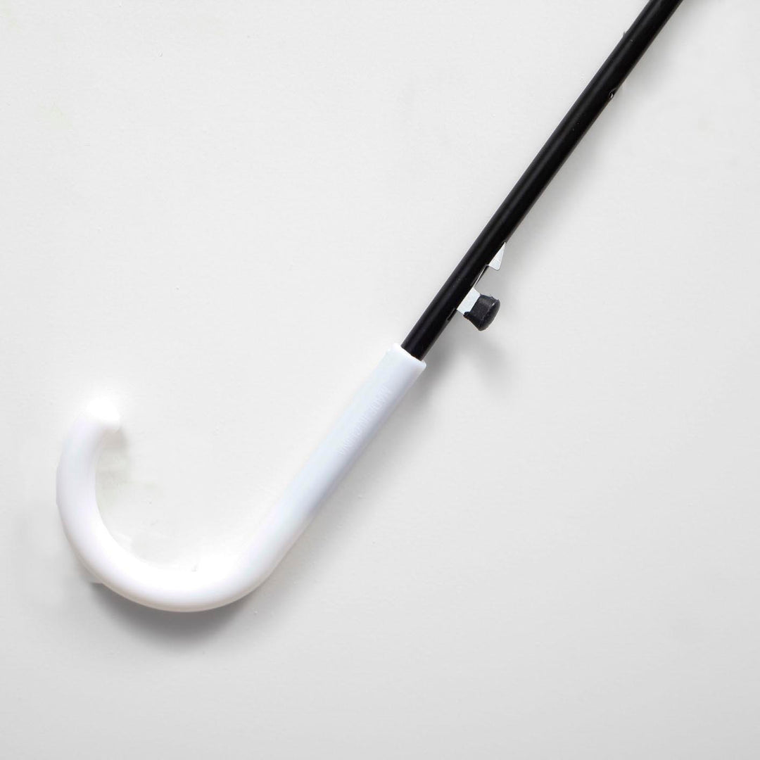 white plastic handle below the open and close button. On a white background