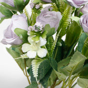  artificial rose flower bouquet close up light purple flowers and green leaves