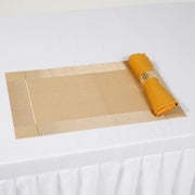 Gold Placemat with Gold Napkin on white Tablecloth
