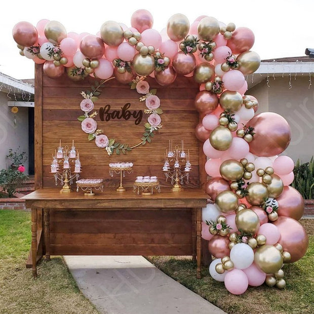 Rose Gold themed balloon garland kit baby shower setup
