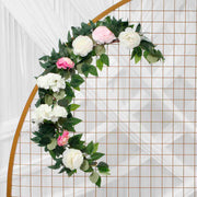 Artifcal Flower and leaf garland, large white, pink flowers and pink/peach smaller flowers, shown on corner of gold mesh frame.