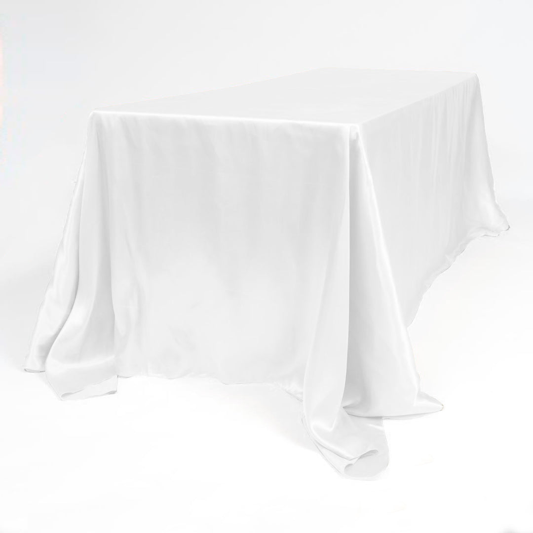 White satin tablelcoth on 6ft trestle table