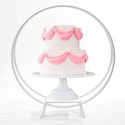 White 2 ring cake stand with 2 tier cake. 